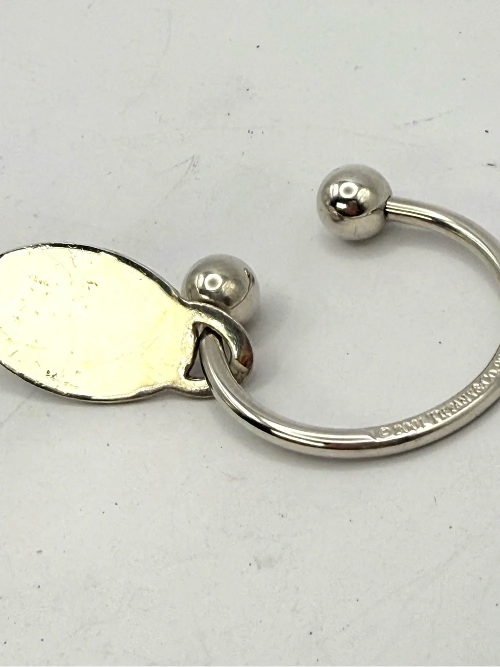 Tiffany & Co. Sterling Silver 'Please Return' Oval Tag Key Ring - Silver Large